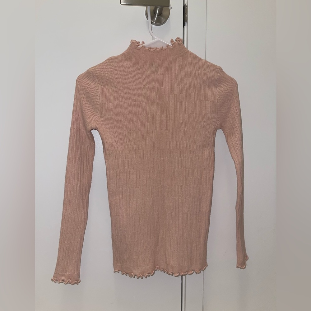 Pink turtleneck from Verge Girl